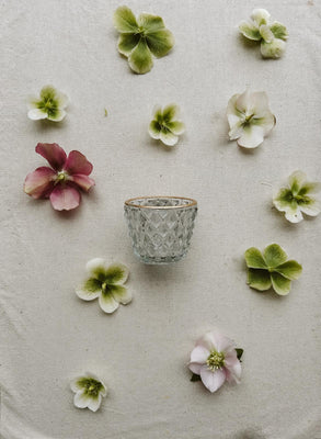 Tea light holder with pressed diamond and gold trim
